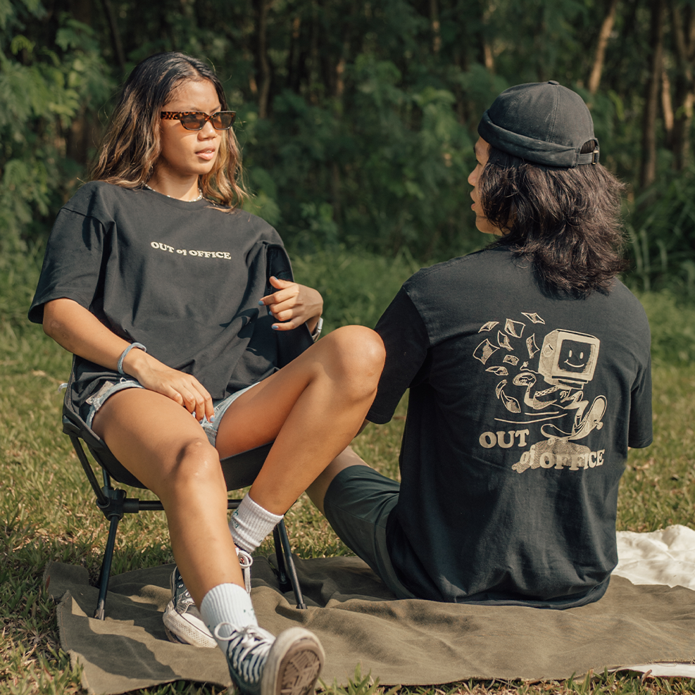 two friends in the outdoors in their day off wearing graphic t shirts